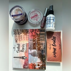 Eyeshadows, foundation, hair product and loose powder